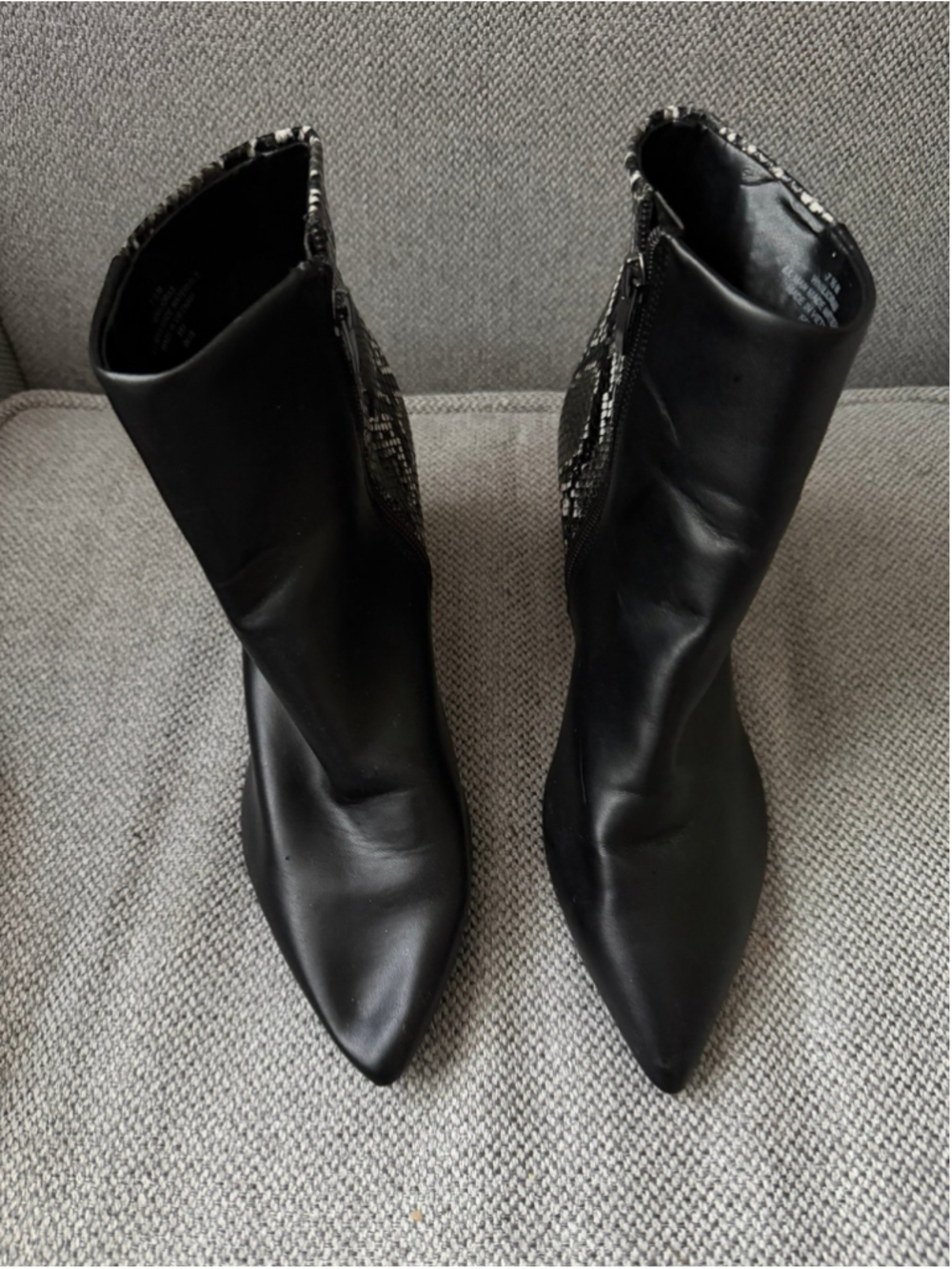 Nine West black ankle boots with a snake-print back panel and a pointed toe 7.5